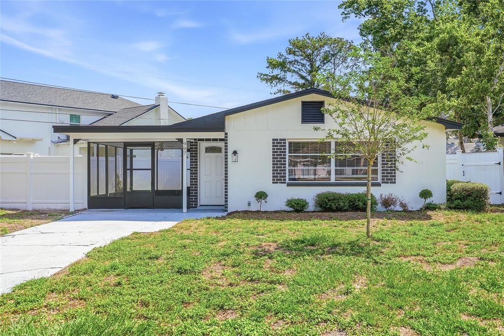 Photo of 997 Cedarwood Avenue, Dunedin, FL 34698 (MLS # TB8512445)