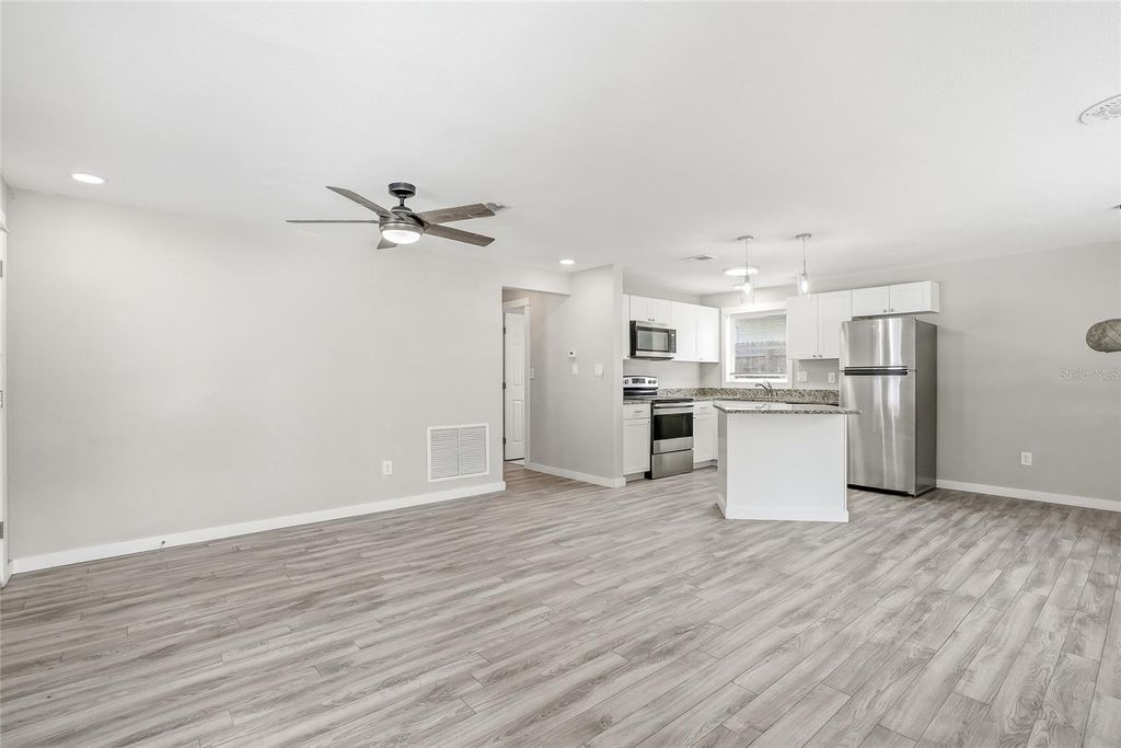 Photo of 997 Cedarwood Avenue, Dunedin, FL 34698 (MLS # TB8512445)