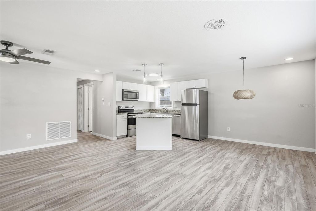 Photo of 997 Cedarwood Avenue, Dunedin, FL 34698 (MLS # TB8512445)