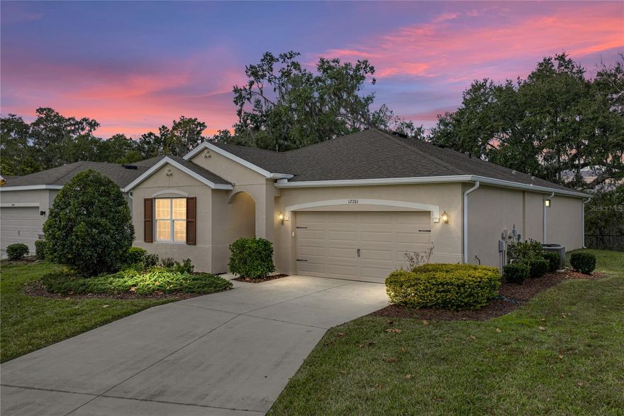 Location, location, location! This beautiful, 1,822 sq. ft., maintenance-free home, is located at the end of the cul-de-sac in Lake Jovita’s gated Eastpointe community. Built in 2018, the home features 2 roomy bedrooms, 2 full baths, plus a flex space that can serve as a den, study or guest room.  The spacious, wide-open, main living area includes the beautiful kitchen, family room and dining room; all with easy to maintain tile flooring, plus plenty of windows that provide abundant natural light and lovely, private wooded views. The gorgeous 18x9 kitchen offers stainless steel appliances, including refrigerator, dishwasher, range and microwave, granite countertops and a large island with bar seating. The generously sized guest bedroom includes a roomy closet and a double window. The primary suite boasts 2 large walk-in closets, a full ensuite bathroom with double sinks, granite countertops and walk-in shower.    Outside, you can relax and enjoy the private, nature views from the large screened and covered lanai. Eastpointe at Lake Jovita is a warm and welcoming, gated, resort community with 2 championship golf courses, tennis courts, fitness center, community pool, basketball and pickleball courts, a beautiful park with paved walking path, a playground and separate dog parks for small and larger dogs.  Golf Carts are welcome on our private streets.  We are conveniently located near excellent shopping, restaurants, medical & educational facilities, and unlimited entertainment options.  Located just 6 miles from I-75, with easy access to other major highways and two international airports.   Don’t miss your opportunity to own this special home and enjoy all that Lake Jovita and the Greater Tampa & Orlando Region have to offer.