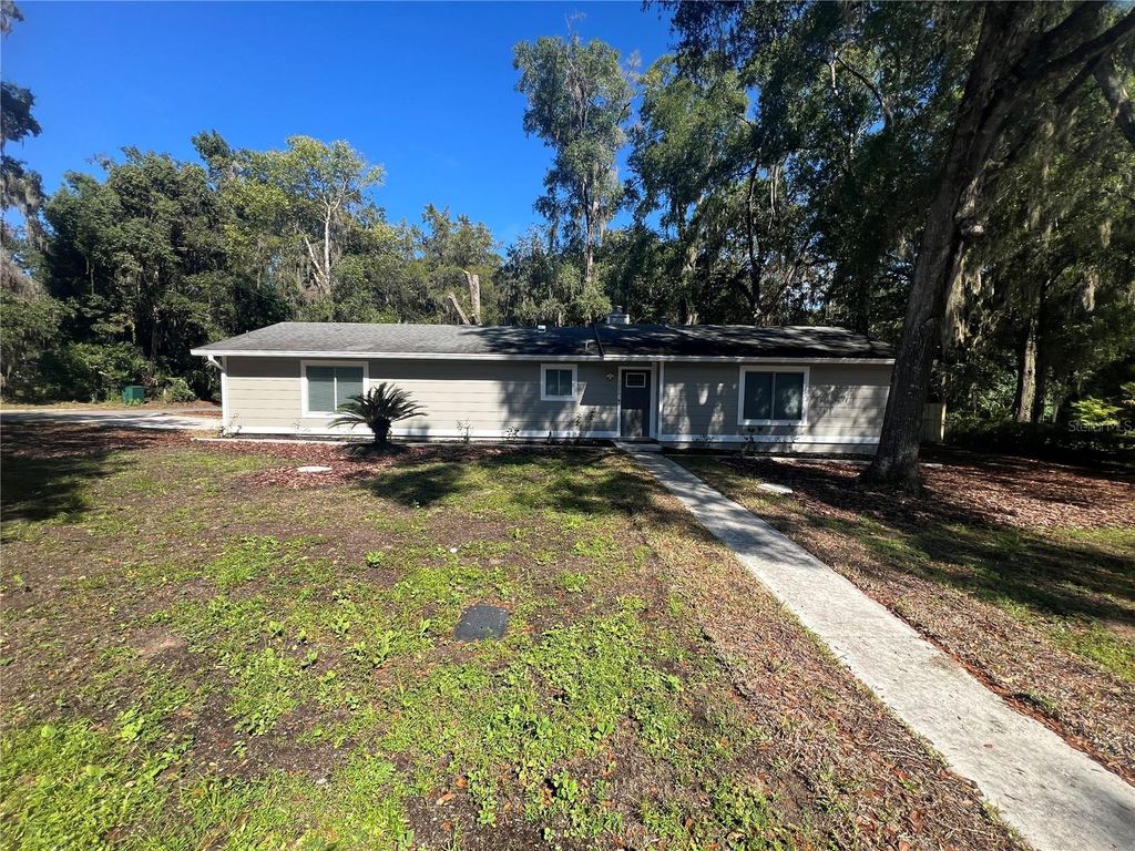 Photo of 1656 NW 31 Place, Gainesville, FL 32605 (MLS # O6353979)