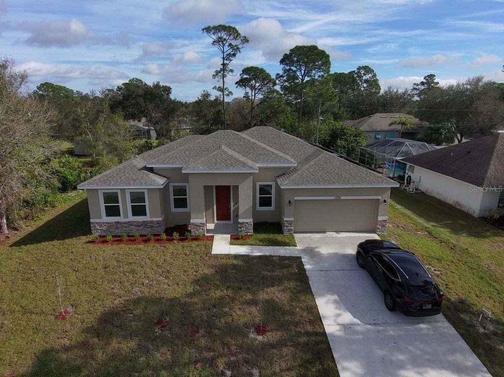 Photo of 1775 Tradewinds Avenue SE, Palm Bay, FL 32909 (MLS # S5137067)