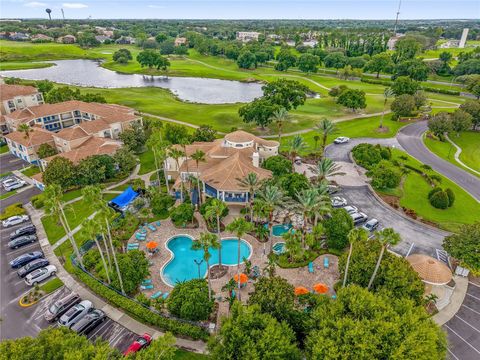 Photo of 7350 Westpointe Boulevard #215, Orlando, FL 32835 (MLS # O6325240)