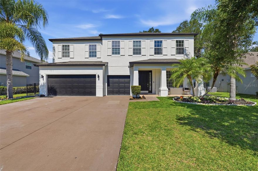 Welcome to a truly one-of-a-kind luxury residence where designer finishes, grand scale, and modern functionality come together in one unforgettable home. This fully remodeled 5-bedroom, 3.5-bath masterpiece offers over 3,000 square feet of elevated living space with custom craftsmanship and upgrades rarely found at this price point.
From the moment you walk through the door, you are greeted by soaring volume ceilings, custom millwork, architectural ceiling details, tongue-and-groove accents, designer chandeliers, and stunning built-in features that immediately create a model-home feel.
At the heart of the home is a spectacular chef’s kitchen designed for entertaining on every level - featuring a massive 10-foot by 5-foot quartz island with dramatic 2-inch countertops, custom cabinetry, premium finishes, and seamless flow into the open-concept living and dining spaces. Just beyond the kitchen is a fully built-out walk-in prep pantry complete with additional cabinetry, floating shelves, workspace, and prep sink - a rare luxury feature that elevates both convenience and entertaining potential.
The expansive floor plan includes a dedicated office, oversized secondary living spaces, a custom fireplace feature wall with built-ins, beautifully upgraded bathrooms, and an impressive upstairs kitchenette complete with quartz counters, sink, microwave, refrigerator, and custom cabinetry - ideal for multi-generational living, guests, or private flex space.
The primary suite continues the luxury experience with custom closet build-outs and thoughtfully upgraded finishes throughout.
Additional highlights include:
• 3-car garage
• Extensive high-end interior remodel
• Custom trim and designer wall detailing
• Architectural ceiling treatments
• Open-concept layout
• Large flexible living spaces
• Fully turnkey condition
Located in the rapidly expanding Moccasin Wallow corridor, this home is positioned in one of the area’s fastest-growing locations with major developments already transforming the community, including BayCare Hospital, new retail and dining destinations, infrastructure improvements, and the highly anticipated Seaire Lagoon development.
This is not just another remodeled home - this is a statement property designed for buyers who want luxury, scale, and lifestyle without compromise.