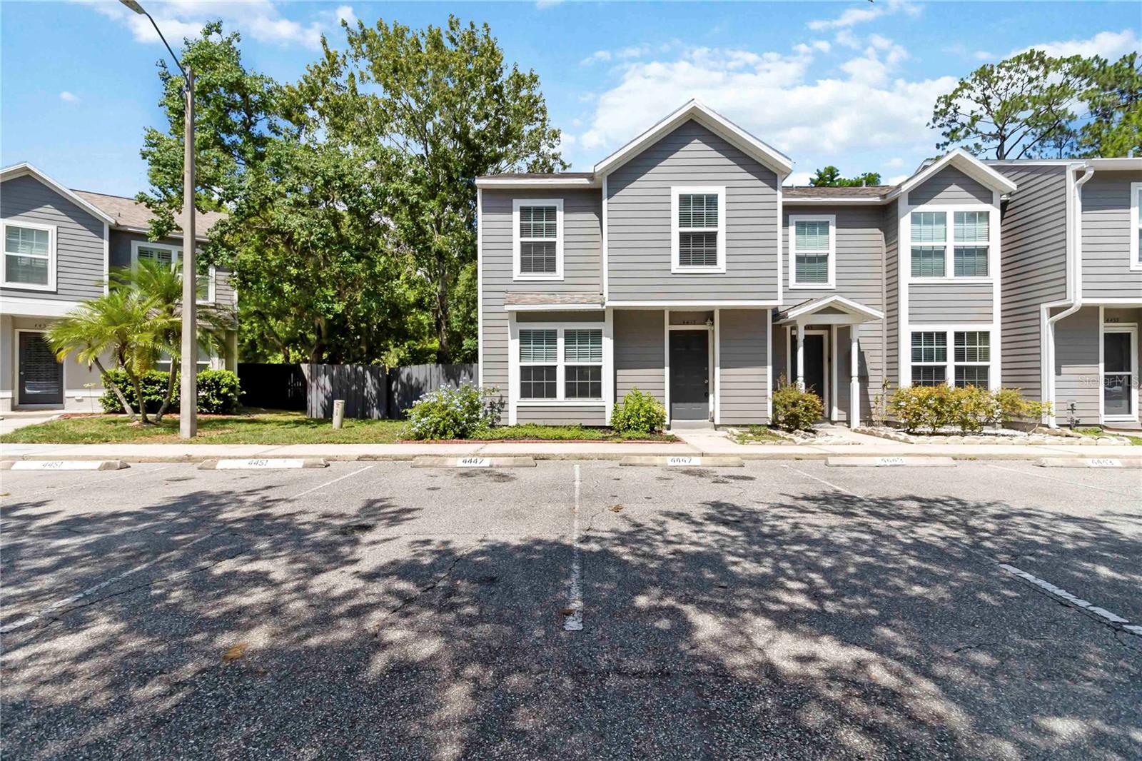One or more photo(s) has been virtually staged. Bundled service pricing available for buyers. Connect with the listing agent for details. Welcome to 4447 Brook Hollow Cir – a beautifully maintained corner-unit townhome located in the heart of Winter Springs. This move-in ready home is perfect for first-time buyers or investors seeking a low-maintenance property in a high-demand area. Inside, you’ll find a bright and open living space with fresh paint and brand-new carpet throughout, creating a clean and modern feel. Upstairs features three spacious bedrooms with ample closet space and natural light, including a private primary suite with an en-suite bath. Enjoy added privacy and outdoor space thanks to the fenced-in yard and corner unit location—ideal for relaxing, entertaining, or letting pets play. .With top-rated Seminole County schools nearby and easy access to shopping, dining, and major highways, this home delivers both convenience and long-term value. Don’t miss your chance to own a turnkey property in one of Central Florida’s most desirable areas!