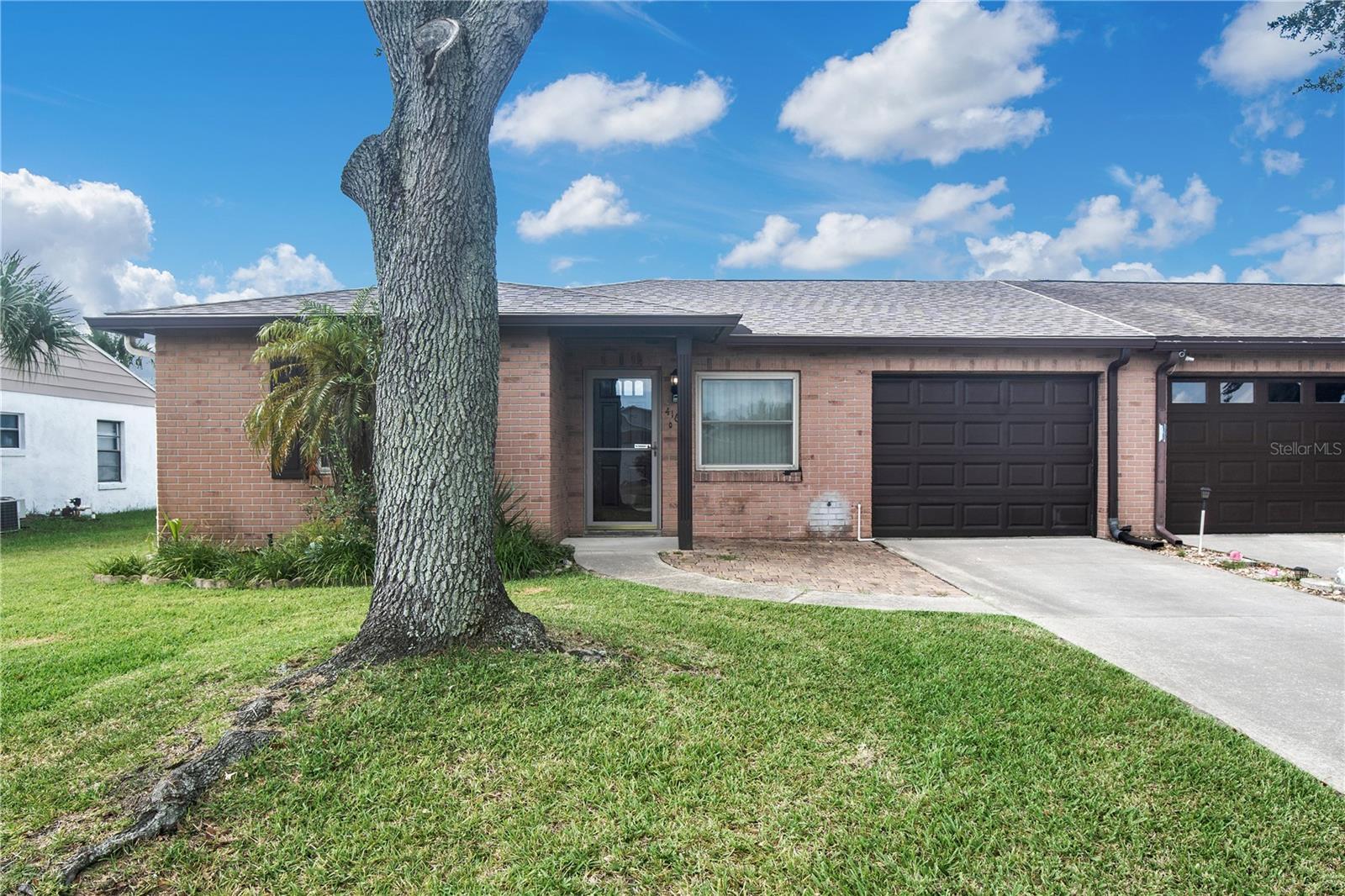 SAVE BIG: 1% lender credit (based on loan amount) toward closing costs or rate buy-down with seller’s preferred lender. Ask for details! This 2-bedroom, 2-bathroom duplex-style home is located in Pelican Cove West, a laid-back neighborhood offering optional amenities and convenient access to the coast. The home features several recent upgrades, including a new roof installed in May 2025, garbage disposal (2024), and a hot water tank replaced in 2024. Enjoy the added value and protection of hurricane-rated windows, providing peace of mind year-round. Additional improvements include leaf filter gutter protection installed in 2020, and a screened-in, covered patio — perfect for relaxing or entertaining. Pelican Cove West offers an optional HOA for just $150/year, providing access to a clubhouse, community events, private rentals, and a pool. Ideally located with easy access to New Smyrna Beach, Daytona Beach, Orlando, shopping, parks, boat ramps, and more, this home offers a practical blend of comfort and convenience.