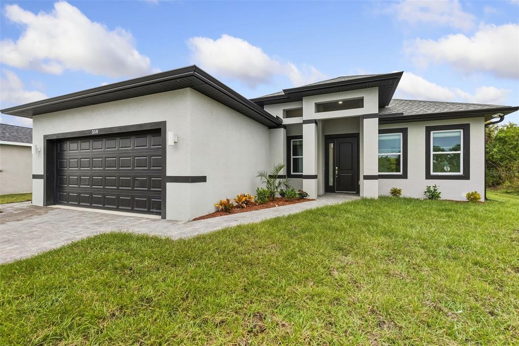 Photo of 558 Rutland Circle, Port Charlotte, FL 33954 (MLS # O6359750)