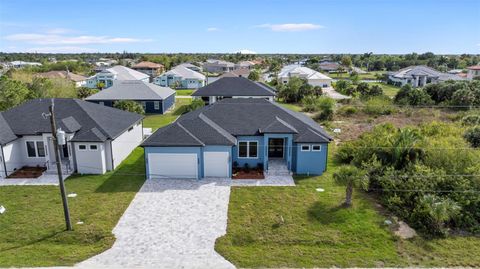 Photo of 15029 Alsask Circle, Port Charlotte, FL 33981 (MLS # OM721182)