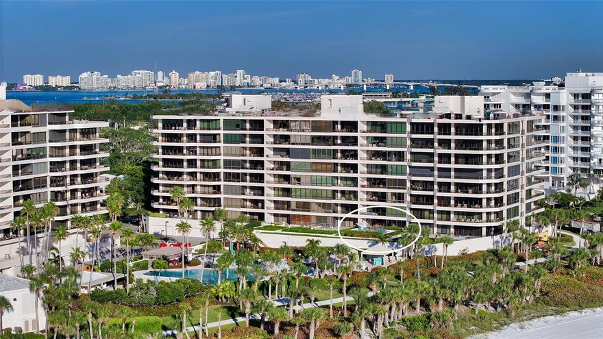 Welcome to your tropical COMPLETELY RENOVATED beachfront home behind the gates of the coveted Longboat Key Club where sophistication meets casual coastal living.  This stylish home was designed by a professional decorator to enhance the natural tropical splendor.  This 2 bedroom plus DEN / 3 full bath home is the perfect retreat to enjoy the true beauty of Florida living with HURRICANE RATED floor to ceiling windows and doors with electronic shades to allow stunning views as well as a SONOS sound system throughout. The den doubles as a private 3rd BEDROOM using an Opaque Smart Glass door that can switch to clear at a flick of a switch. Upon entering the home, you’ll be met with warm elegance from the pleasing colors, the modern linear electric fireplace, built-in wall nooks, stylish lighting fixtures and light-colored luxury vinyl floors throughout. Chefs of all levels will enjoy this exceptionally appointed kitchen featuring sleek white cabinetry and countertops with sophisticated hardware, a Viking Refrigerator, Wine Fridge and Beverage Fridge as well as a Miele Induction Cooktop plus a Bosch Oven and Microwave. There’s also a large center island, and a cheerful breakfast nook with sliders to the front terrace overlooking the swaying palm trees.  The light and bright owner’s retreat boasts stylish wallpaper, designer lighting fixtures, a gleaming en-suite bathroom, and a spacious, custom walk-in closet.  The second guest suite has sliding doors leading to the front terrace as well as a full en-suite bathroom. The primary bedroom and the main living area benefit from having sliders to a uniquely EXPANSIVE 40 x 30 TERRACE allowing the much sought-after WALK OUT to the heated pool/hot tub and the beach where you’ll enjoy an abundance of sunset views over the Gulf.  From there it’s just a short stroll to the Longboat Key Club, where membership is optional. PET FRIENDLY Sanctuary is a true beachfront community offering residents Resort-Style Amenities including a heated Olympic size pool, hot tub, 2 Har-Tru tennis courts, a fitness center, club house with catering, social rooms, walking trails, a manned gate and on-site management.  St. Armand’s Circle, City Island and downtown Sarasota are just a few short miles away. Bedroom Closet Type: Walk-in Closet (Primary Bedroom).