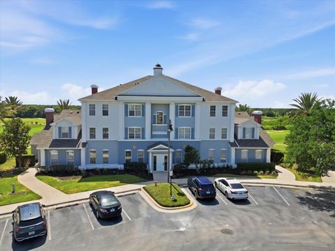 Photo of 7609 Heritage Crossing Way #201, Reunion, FL 34747 (MLS # O6405824)