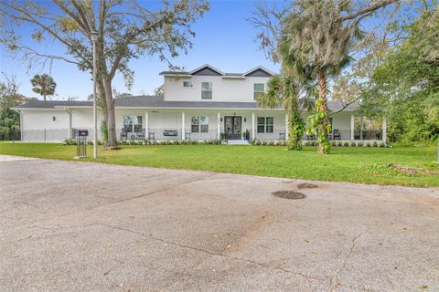 Photo of 599 Glendevon Drive, New Smyrna Beach, FL 32168 (MLS # O6285669)