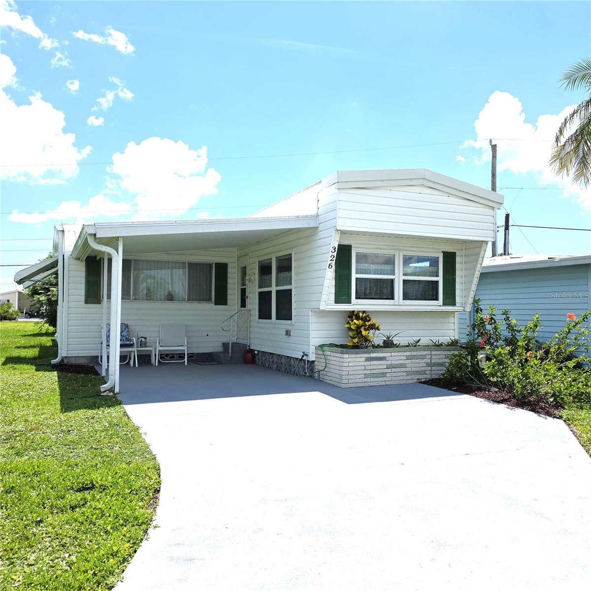 **WOW** What a deal!! NO monthly HOA fee - Only $99.00 a YEAR!! Check out this totally renovated and well maintained spacious home. Turn-Key Furnished, Move-IN Ready, 2023 Roof Over, 2024 Tankless hot water heater, indoor washer & dryer, luxury vinyl plank flooring, light and bright interior, golf cart or extra car parking. Great seasonal residence/rental.
Harbor Cove - Voted BEST Manufactured Home Community by North Port Sun Reader's Choice. Offering a private community boat ramp, 90 slip marina, two story clubhouse, two heated pools, hot tub, bocce, tennis, pickle ball, fitness, storage grounds, wood working shop, crafts dinners, dances, entertainment and more. Easy commutes to Sarasota and Fort Myers. Minutes from the gulf beaches, Myakka River, Peace River, Charlotte Harbor, restaurants, shopping, Tampa Bay Rays summer training stadium, Warm Mineral Springs Health Spa, Cool Today stadium for the Atlanta Braves, and the Allegiant Airlines SunSeeker Resort located in Charlotte Harbor. EVERYTHING you need for your waterfront lifestyle is here in Southwest Florida.
All information contained within this listing, including room dimensions, interior, exterior, land, site, community, tax, and additional information is deemed reliable but not guaranteed and should be verified by the Buyer and Buyer's Agent.
