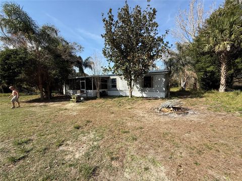 Photo of 7740 Pretty Lake Road, Clermont, FL 34714 (MLS # G5108992)