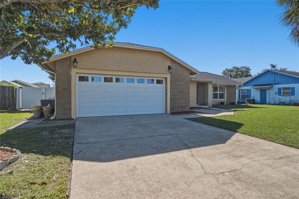 Photo of 12257 Medan Street, Orlando, FL 32837 (MLS # O6398876)