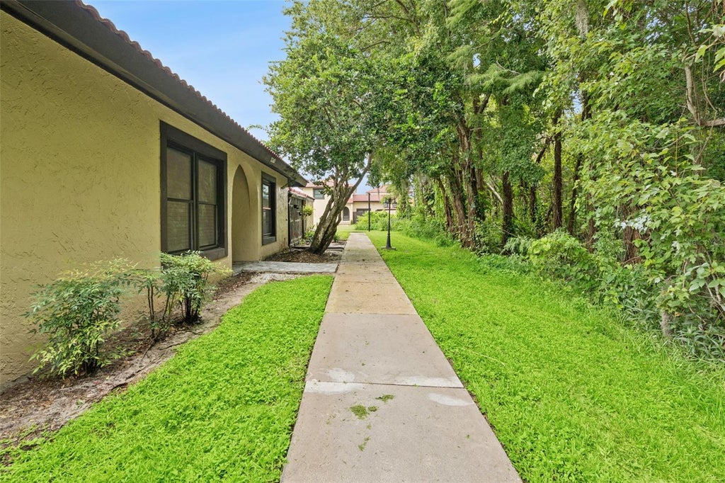 Photo of 530 Hunter Circle, Kissimmee, FL 34758 (MLS # O6431454)