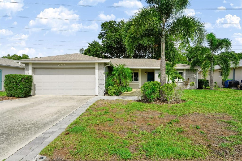 Photo of 744 Green Valley Road, Palm Harbor, FL 34683 (MLS # TB8554830)