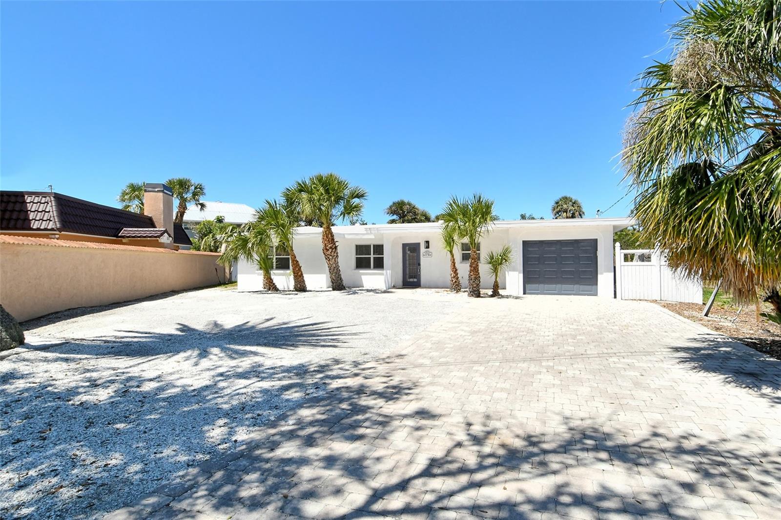 NEWLY RENOVATED UNFURNISHED HOUSE ON CASEY KEY!! Cute one story ranch style house tucked away on a cul-de-sac on private Casey Key. One car garage and behind the house is a large lawn leading to a dock on a mangrove lagoon that leads out to the intracoastal waterway, perfect for kayaking . This house has two bedrooms and two bathrooms, the main living areas are all open plan that include the kitchen. Great location not too far from the Albee Farm Bridge to the mainland. WATERFRONT/UNFURNISHED/CASEY KEY/SINGLE STORY/VENICE/SARASOTA/BEACH LOCATION. This won't last long!
