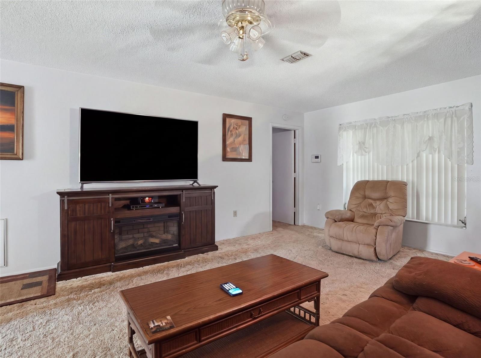 11121 ROLLINGWOOD DRIVE