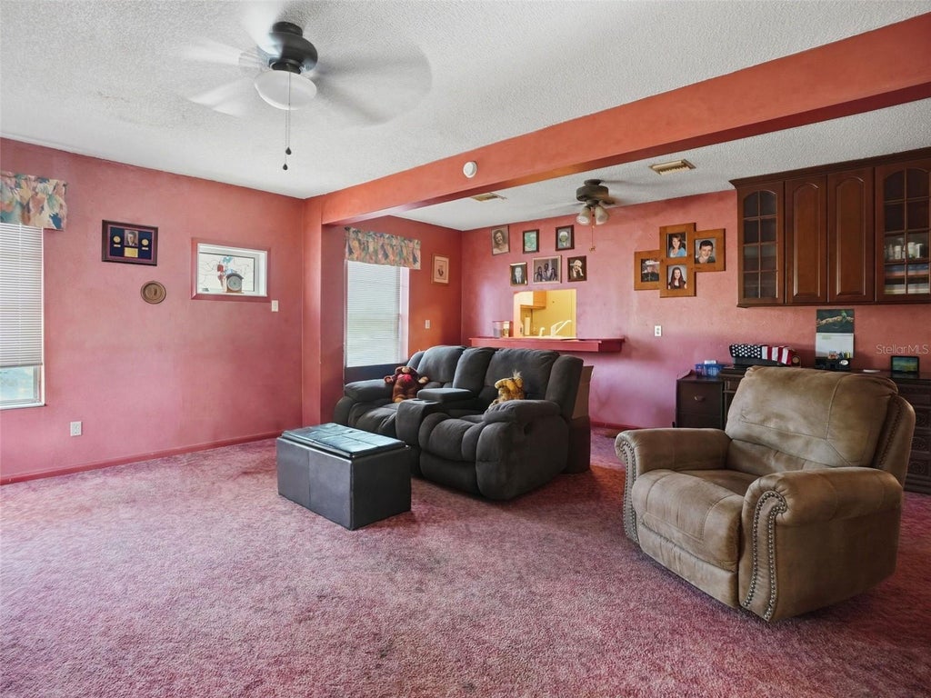 Photo of 11121 Rollingwood Drive, Port Richey, FL 34668 (MLS # W7889231)