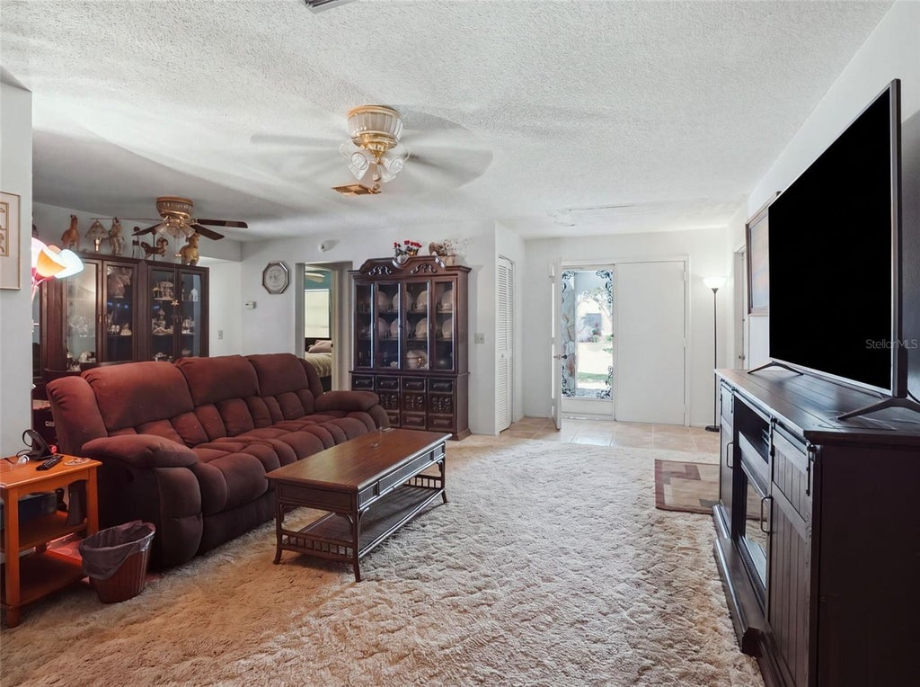 Photo of 11121 Rollingwood Drive, Port Richey, FL 34668 (MLS # W7889231)