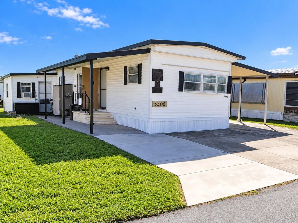 Photo of 5306 Astrid Drive, Zephyrhills, FL 33541 (MLS # TB8560320)