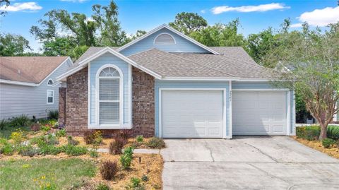 Photo of 7761 Fox Knoll Place, Winter Park, FL 32792 (MLS # O6401159)