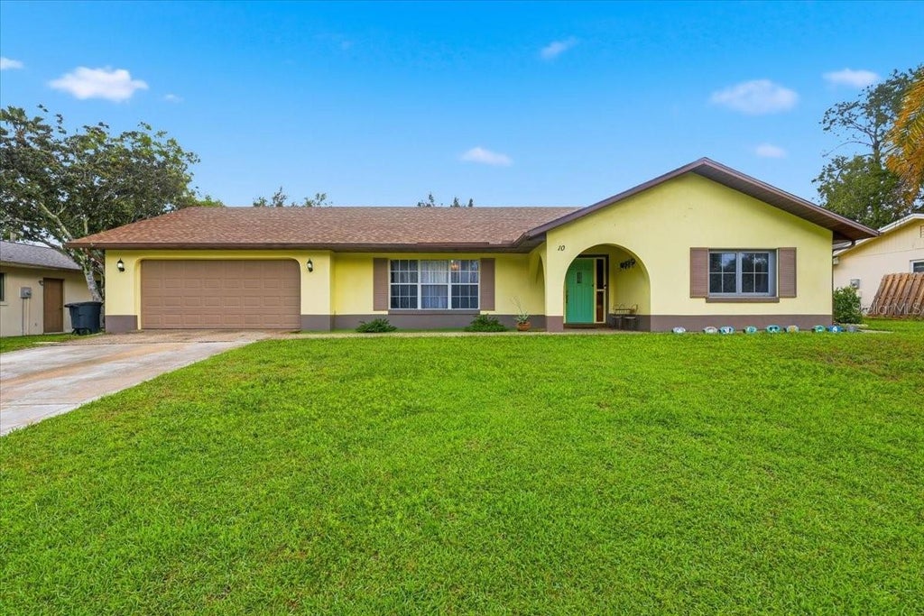 Photo of 10 Blackburn Place, Palm Coast, FL 32137 (MLS # FC320664)