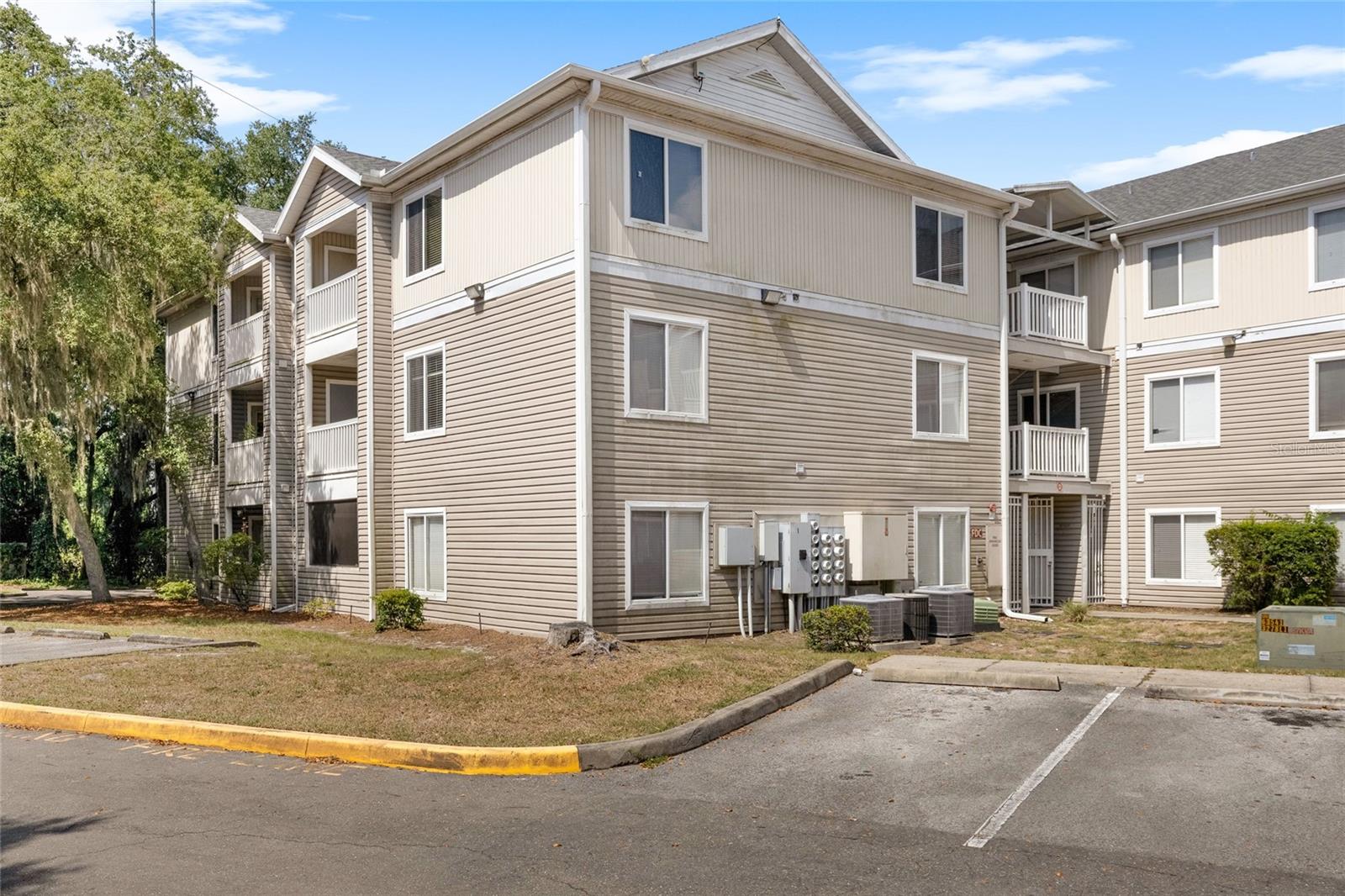 This second floor condo offers 4 bedrooms each bedroom has its own bath and walk in closet. Close to UF Campus, VA Hospital, Shands Hospital and biking distance to Archer Road eateries. Student oriented community - a great studying atmosphere. Community features pool, basketball courts and gym, plenty of parking and covered bus stop in front of building!High speed internet is included in the HOA due.