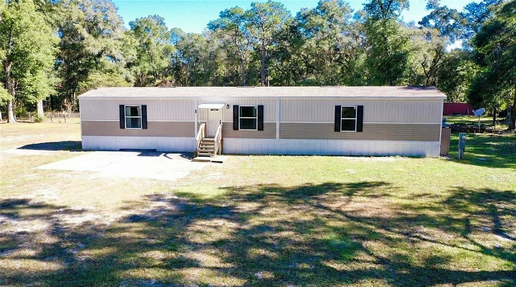 Photo of 15277 SW 105th Avenue, Dunnellon, FL 34432 (MLS # OM715143)