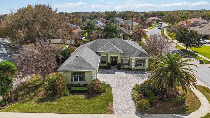 Welcome to 4202 Belle Grove Court, nestled within the highly sought-after gated community of Conway Isles. This beautifully landscaped corner-lot residence offers 4 bedrooms, 3.5 bathrooms, and a bright open floor plan designed for both comfort and entertaining. 

Adding to its exclusivity, this home boasts the only circular driveway in the neighborhood, surrounded by lush, manicured landscaping. A rare opportunity and an absolute must-see!

Inside, you’re welcomed by a spacious open floor plan featuring an abundance of natural lighting and a large living room with a wood burning fireplace and sliding glass doors that showcase views of the pool while providing seamless outdoor access. A thoughtfully located powder room off the living room provides easy access for guests. The kitchen and breakfast nook flow effortlessly into the main living area and also offer direct access to the patio through additional sliding doors — creating the perfect setup for indoor-outdoor living and entertaining. The kitchen features beautiful granite countertops and a generously sized walk-in pantry for added convenience. Just beyond the kitchen, you’ll find the laundry room and a full bathroom with a walk-in shower that also provides direct access to the pool area!

On the opposite side of the home, a split-bedroom floor plan offers added privacy and comfort. The spacious primary suite is tucked away in the back corner of the home and features an oversized walk-in closet and a beautifully appointed en suite bathroom complete with a double vanity, walk-in shower, and relaxing garden tub. Sliding doors from the primary bedroom also provide direct access to the pool area, creating a true private retreat. At the front of the home, you’ll find three additional bedrooms along with a full bathroom that features a double sink vanity and a shower/tub combo. 

Step outside to your own private paradise. The beautifully enclosed patio features elegant pavers and a relaxing pool, perfect for enjoying Florida living year-round. The spacious backyard is highlighted by lush landscaping, fruit trees, and a storage shed, creating a serene outdoor retreat that truly feels like your own personal oasis.

Residents of Conway Isles enjoy exclusive access to community amenities including a park, playground, gazebo, sand volleyball court, and is just minutes from the beautiful Lake Conway Chain of Lakes. Conveniently located only 10 minutes from A-rated Cornerstone Charter Academy (K–12), as well as Orlando International Airport, downtown Orlando, world-renowned theme parks, premier shopping, dining, and major highways — this location truly offers the best of Central Florida living.

Call us to schedule a showing TODAY!

**SEE ATTACHMENTS WITH UPGRADES AND IMPROVEMENTS!**