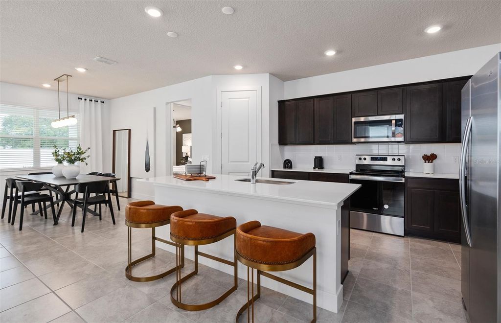 Photo of 4747 Harrington Fields Dr, Davenport, FL 33837 (MLS # O6428647)