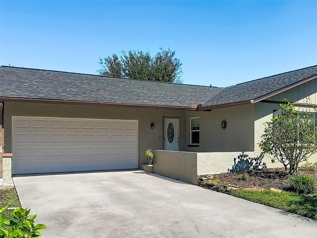 Photo of 1852 Sourwood Boulevard, Dunedin, FL 34698 (MLS # TB8558224)