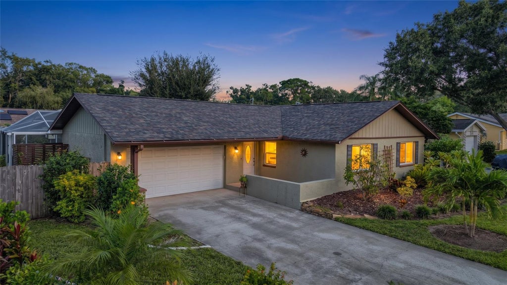 Photo of 1852 Sourwood Boulevard, Dunedin, FL 34698 (MLS # TB8558224)