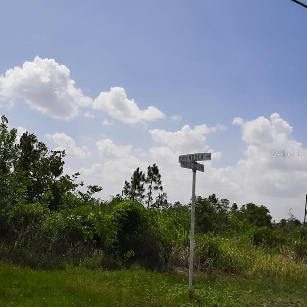 Photo of 414 Calendula Drive, Indian Lake Estates, FL 33855 (MLS # TB8393890)