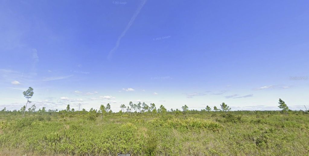 Photo of 414 Calendula Drive, Indian Lake Estates, FL 33855 (MLS # TB8393890)