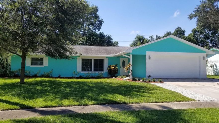 Great Seminole home!   3/Bed 2/Bath 2/car garage with 1780 sq ft in sought after Seminole! Newer roof.  Huge dream kitchen with black granite countertops, an abundance of cabinet space, and a built in desk with side pantries. The house has a true split plan with the primary bedroom and en suite bathroom on the garage side and two bedrooms, with ample closet space, and the other full bathroom on the opposite side. If that's not enough, decide which living room to lounge in. The front one when you entire the home or the back family/living room with a gas fireplace, vaulted ceilings, and plenty of natural light. Step out back and enjoy what Florida has to offer, in the screened enclosure with custom pavers or the inviting fenced in backyard.  Large shed with electrical and the backyard still has room for a pool. The home is a quick five minute drive in either direction to the white sandy beaches that Pinellas County is recognized for.  No HOA's. Don't delay, this home is just waiting for your personal touches!