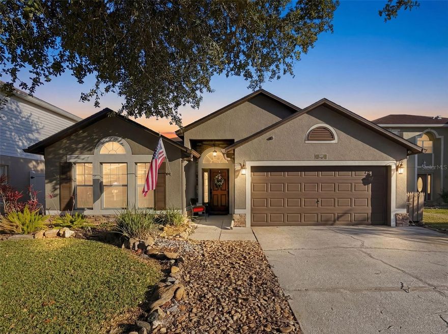 Meticulously maintained 4BR/2BA water view home in the sought-after Aberdeen community featuring NO CDD and LOW HOA, ideally located in the heart of Wesley Chapel. This open-concept, split-floor plan home includes vaulted ceilings with beams, lighted plant shelves, and a custom accent wood wall in the living room.

The renovated kitchen offers granite countertops, brand new refrigerator (2025), tile backsplash, upgraded sink, solid wood cabinetry with pull-out shelves, breakfast bar, custom built-in pantry with barn door, and added cabinetry for extra storage. The spacious primary suite features tile floors, ambient crown lighting, plant shelves, a renovated ensuite with solid wood cabinets, walk-in shower, added storage, and a large walk-in closet. Secondary bedrooms feature newer carpet and are conveniently located near the guest bath with tub/shower combo and built-in hallway storage niches. 

A standout feature is the fully insulated, air-conditioned 12x20 flex space (2021) with 220V and 110V power, ideal for a workshop, in-law suite, guest quarters, or exercise room. Additional upgrades include a new A/C (2022), roof (2017), tankless water heater (2016), fence with multiple gates (2018), 10x16 storage shed with power (2018), widened driveway, stone accents, automatic sliding door to the screened lanai, dog washing station with hot and cold water, French drains, sprinkler system, water softener, and gutters.

Enjoy the 20x20 screened patio with an insulated roof overlooking a peaceful pond-view backyard—perfect for relaxing or entertaining. Conveniently located near Wiregrass Mall, Epperson Lagoon, multiple golf courses, colleges, hospitals, I-75 and I-275, Tampa Premium Outlets, beaches, airports, Busch Gardens, Disney theme parks, dining, and shopping. Don’t miss this exceptional opportunity!