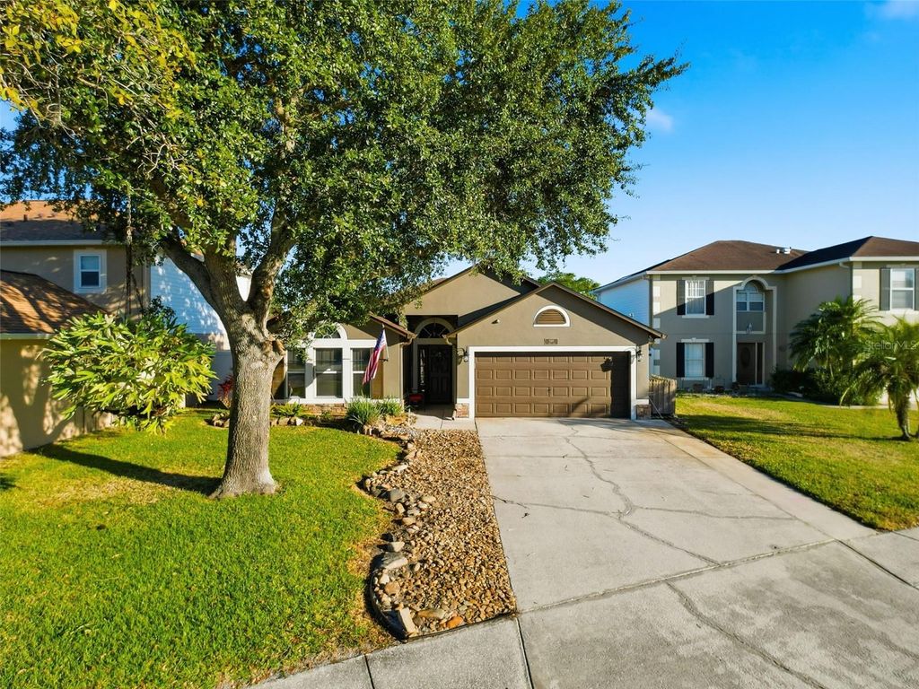 Photo of 5407 Treig Lane, Wesley Chapel, FL 33545 (MLS # TB8466669)