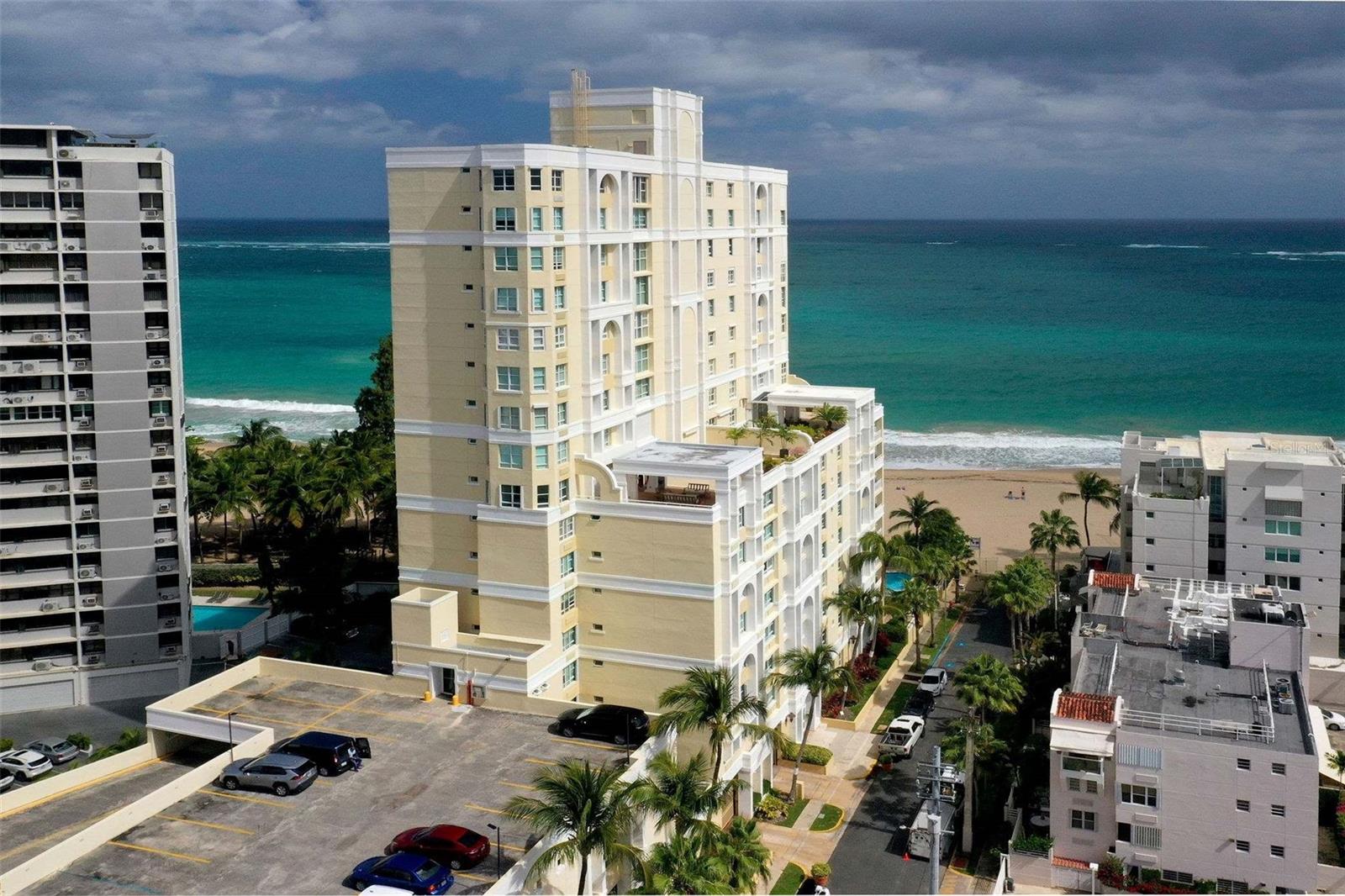 Experience the ultimate beachfront lifestyle in this stunning oceanfront residence, located on the best street in the Condado–Ocean Park area. Situated in Carrion Court 6, this spacious 3-bedroom apartment offers unparalleled views of the turquoise waters of the Atlantic Ocean and the building’s resort-style pool, making every day feel like a vacation. With abundant natural light and an open layout, this home creates an inviting and airy ambiance. Enjoy the ocean breeze from your private balcony, perfect for morning coffee or sunset cocktails.
The apartment is part of a prime, full-amenity building, featuring a full generator, 24-hour security, a newly furbished gym equipped with high-end machines, and a pool, ensuring comfort and peace of mind year-round. For added convenience, the apartment also includes an EV charging station for your electric vehicle. Located in the heart of Ocean Park, one of the most sought-after neighborhoods in San Juan, you’ll have the ocean as your backyard, with direct beach access just steps away. This quiet, tree-lined street offers a perfect balance—serene and residential, yet just minutes from Condado’s best restaurants, boutiques, and vibrant nightlife. Additionally, this prime location is within walking distance to the best private schools in Puerto Rico, making it an ideal home for families. With two parking spaces and top-tier amenities, this is an opportunity to own a piece of Puerto Rico’s most desirable beachfront community.