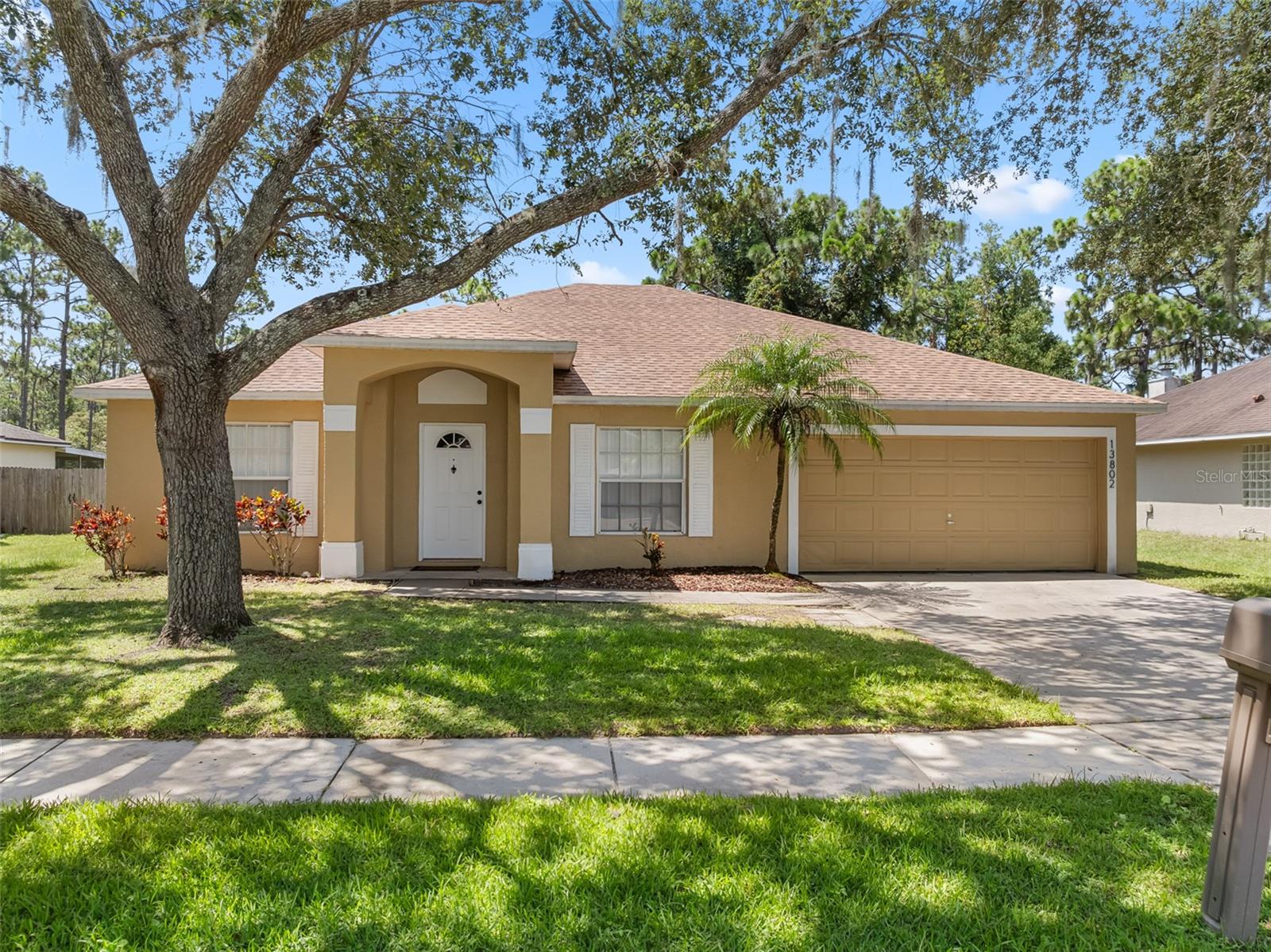 Don’t miss this move-in ready gem! Featuring a newer 7-year roof, brand new 2025 A/C, and a sleek brand new 2025 stainless steel appliance package in the kitchen, complete with beautiful tiled flooring, making it stylish and easy to maintain. Enjoy the peaceful backyard that backs up to conservation—no rear neighbors! Lovingly maintained and just one block from the community pool and tennis courts. Tucked in a quiet neighborhood near UCF—close to everything, yet feels like a retreat. Welcome to SANCTUARY.