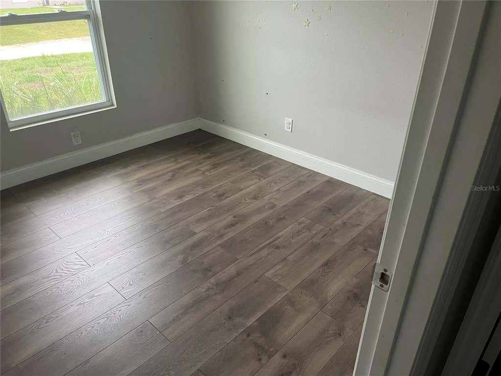 Photo of 619 Hickory Avenue, Orange City, FL 32763 (MLS # S5151115)