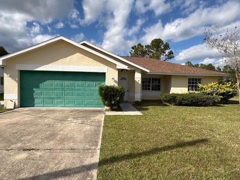 Photo of 7 Brownstone Lane, Palm Coast, FL 32137 (MLS # O6369613)