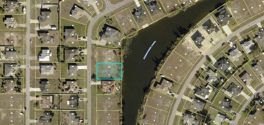 Discover your own slice of paradise with this stunning waterfront lot located in one of the newer areas of Northeast Cape Coral. Wake up to breathtaking sunrises and unwind with spectacular sunsets over the water. Enjoy convenient access to nearby golf courses, fantastic restaurants, and plenty of outdoor activities. For those who love to travel, US-41 and I-75 are just minutes away—making weekend getaways a breeze. Don’t miss this opportunity to build your dream home and start living the ultimate Southwest Florida lifestyle!