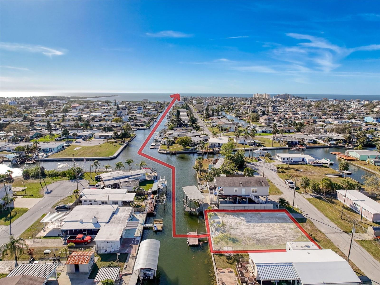 This CLEARED WATERFRONT LOT is located in the VISTA DEL MAR SUBDIVISION featuring 60ft of WATERFRONT, a CONCRETE SEAWALL w/TOP WALK, a 12X32ft CONCRETE WATERSIDE PATIO, a MOBILE HOME PAD, WATER and SEWER CONNECTED and ELECTRIC at the TELEPHONE POLE! All of your local restaurants like INN ON THE GULF, SAM'S BEACH BAR, OLLIE"S ON THE BEACH and GET HOOK are a 5 minute drive. HOSPITALS & SHOPPING as well. The TAMPA BAY AIRPORT, TAMPA BAY, CLEARWATER BEACH, HOMMOSSA SPRINGS, TARPON SPRINGS, PINE ISLAND, HONEYMOON ISLAND and WEEKI WACHEE are approximately 1 hour away. Build your DREAM HOME. FISH & CRAB off your own dock or take a KAYAK, JET SKI or BOAT RIDE to the GULF OF MEXICO where the FISH ARE PLENTIFUL, the FUN is NEVER ENDING and the SUNSETS are ALWAYS AWESOME!