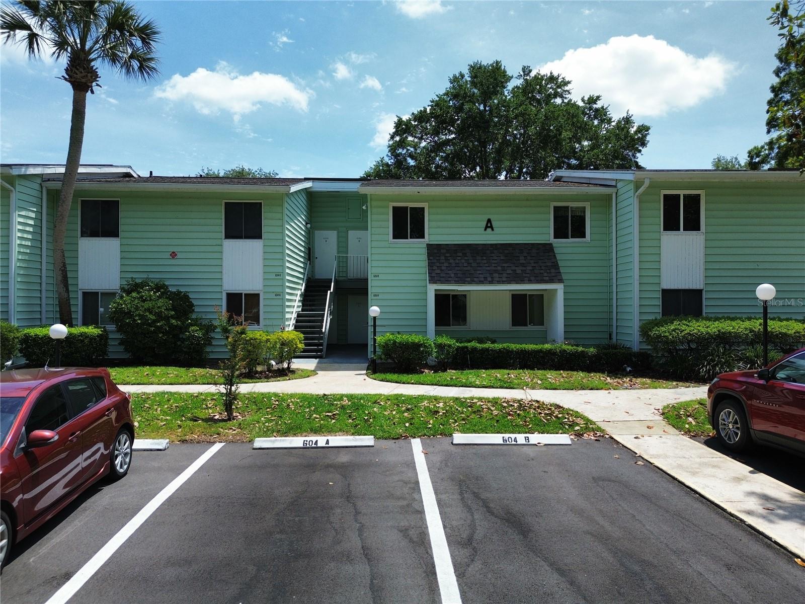 2nd floor condo located in the 55+ community of Live Oak Village. Enjoy views of the Silver Springs Shores Golf Club and Lake Jade in the background. In the distance is Florida Greenway land that has been set aside by the state to not be developed and remain in it's natural state. This condo offers you 1138 square feet of living space under air with 2 full bedrooms and 2 full baths. Washer & dryer are located inside the 2nd bathroom. Monthly HOA fees include insurance, maintenance on the building and yardwork, garbage pickup, cable tv and use of the clubhouse and community pool. Also located nearby is the Silver Springs Shores Community Center providing 3 pools and many activites for all for only $5 a person each year. Condo needs some TLC with flooring and paint.