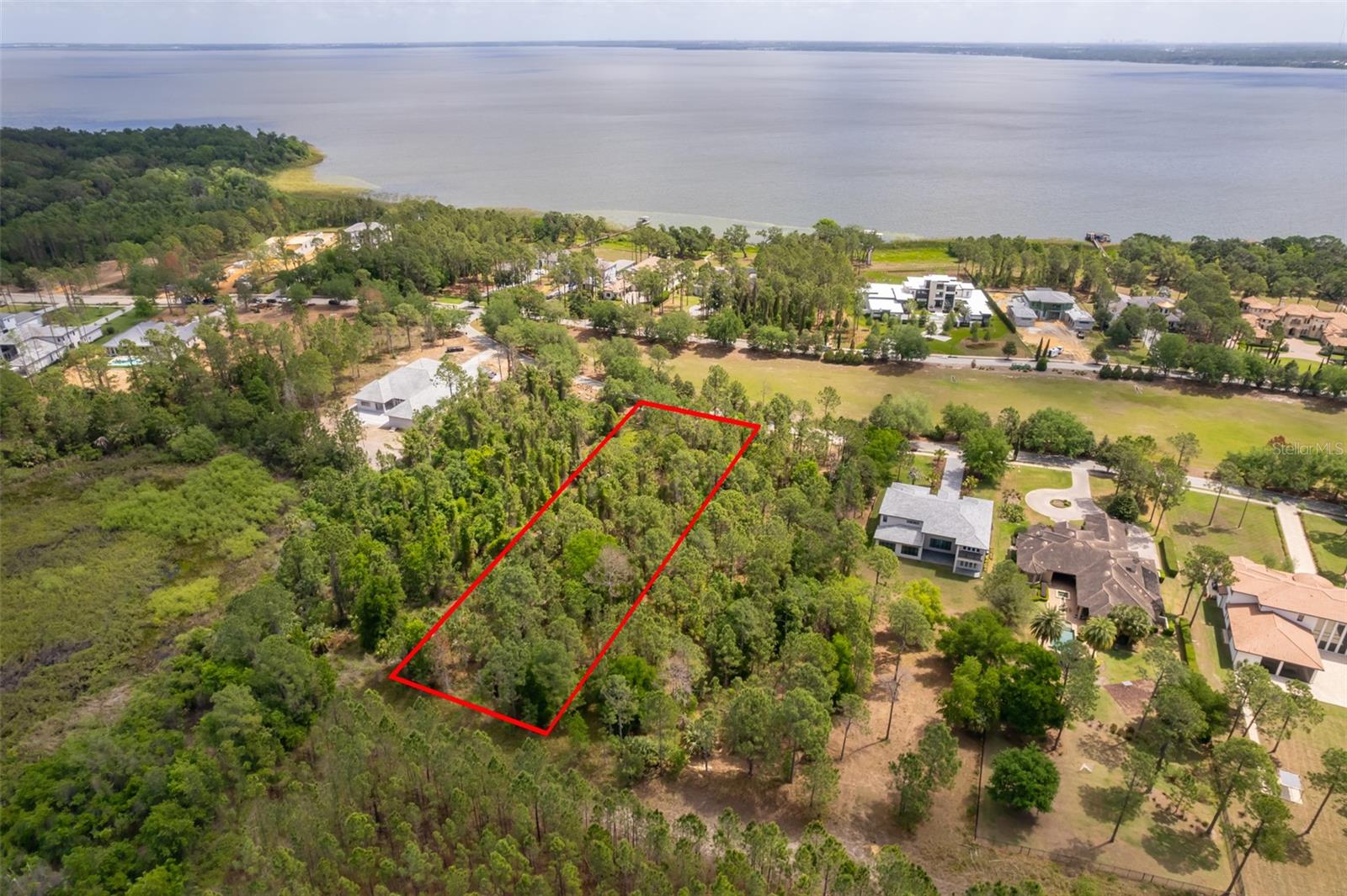 A rare opportunity in Bella Collina. This prime homesite is one of the last 1+acre conservation lots available. Nestled in the heart of Central Florida , guard-gated Bella Collina community, this exceptional 1 acre vacant lot offers the perfect site to build your custom estate. Surrounded by lush conservation land, with no front or back neighbors, the property provides unparalleled privacy, serenity, and breathtaking natural views. With ample space to design your dream home, enjoy the tranquility offered by nature while being just a few minutes away from world-class amenities - including the renowned Nick Faldo-designed golf course, a Tuscan-inspired clubhouse, fine dining, resort-style pool, full-service spa, tennis and pickle-ball courts, and more.