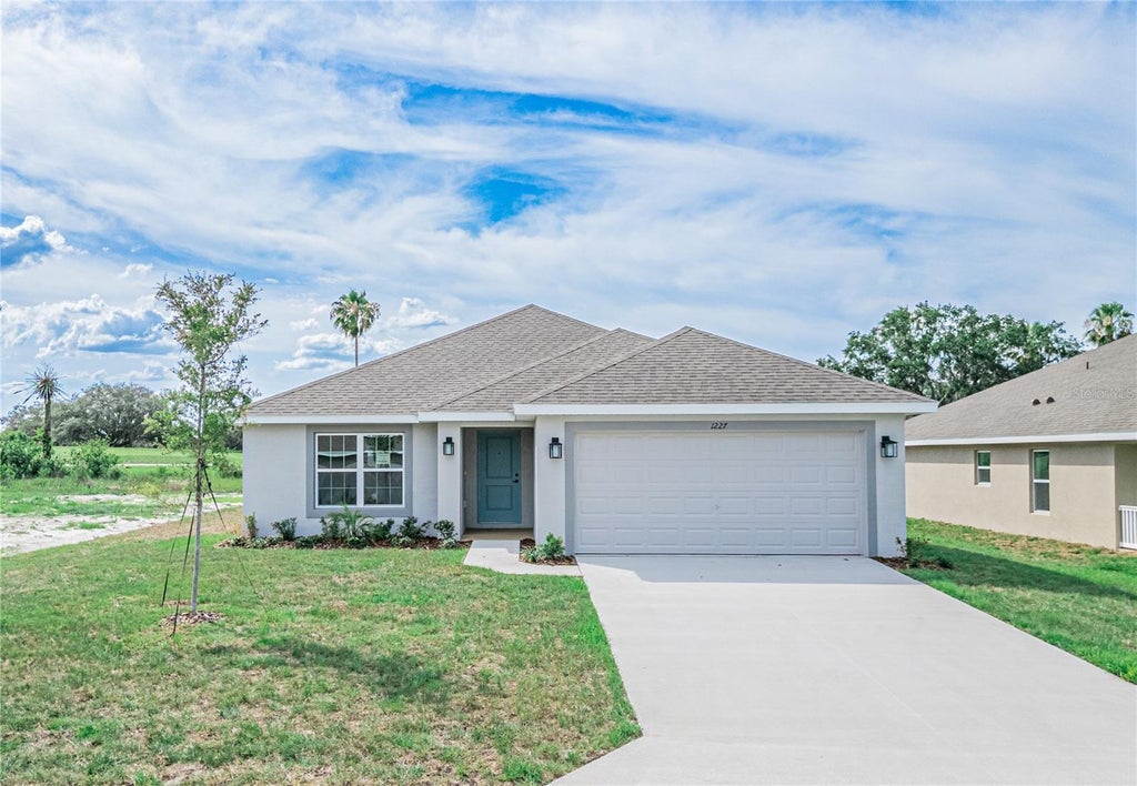 Photo of 1227 Hickory Nut Drive, Lake Wales, FL 33898 (MLS # L4959911)