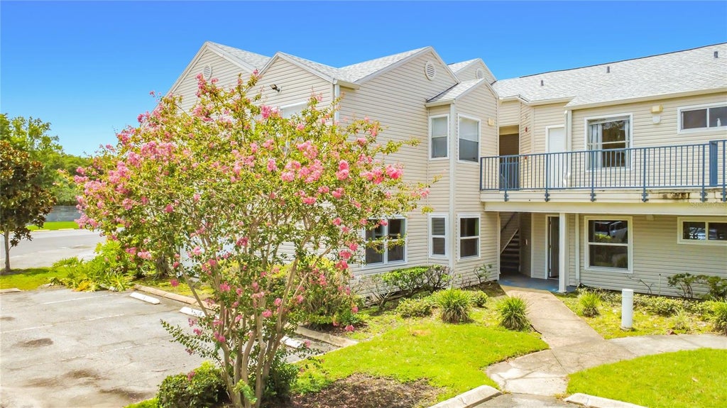 Photo of 2504 Woodgate Boulevard #203, Orlando, FL 32822 (MLS # O6424900)