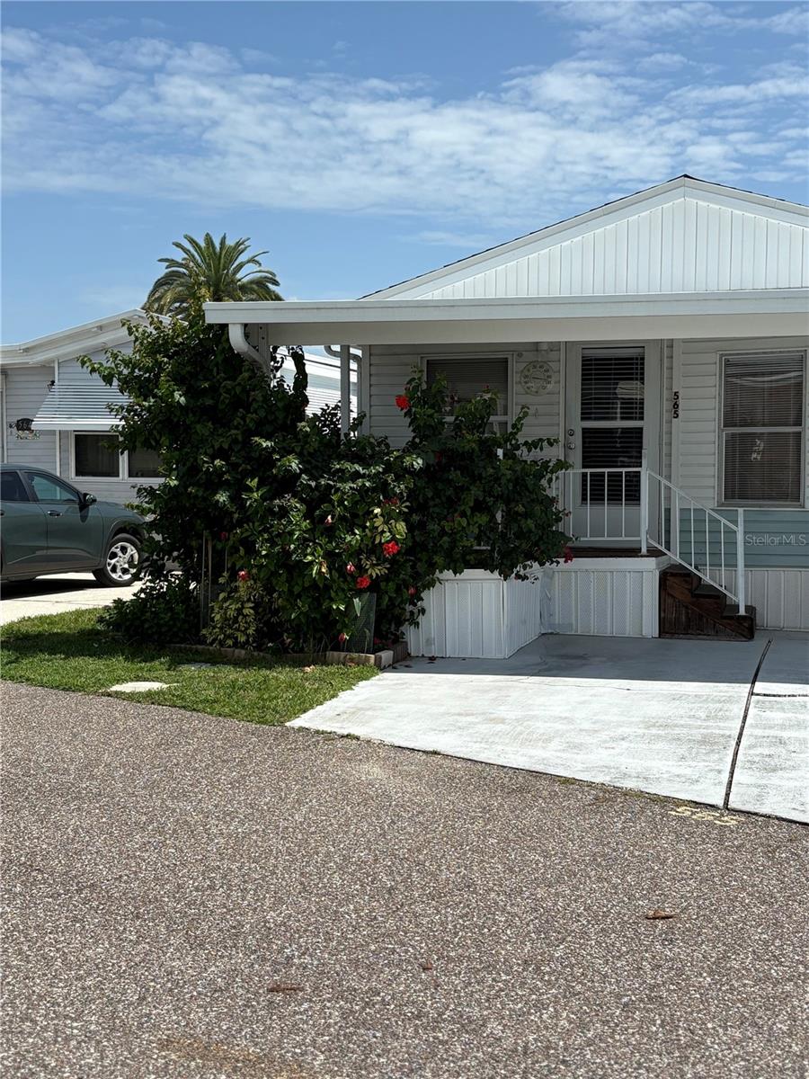 LOCATION, LOCATION, LOCATION! This furnished doublewide home, located near the club house in this 55+ guard-gated community, has everything you need to enjoy your Florida time including access to Lake Davenport, swimming pool, shuffleboard, 9-hole golf chip & putt, tennis/pickleball, a Clubhouse with entertainment (including Bingo!), and much more! In addition to the one bedroom, there is a flex room that can be used as 2nd bedroom for your guests. If you wish to venture out, you are just 6 miles to Disney and not too far from Universal Studios, Seaworld and great food! Ready for new owners! Seller's personal items excluded.