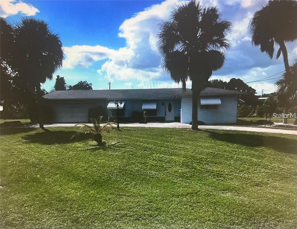 Photo of 644 Blue Lane NW, Port Charlotte, FL 33952 (MLS # D6144965)